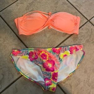 Mismatched orange top and floral bikini bottom